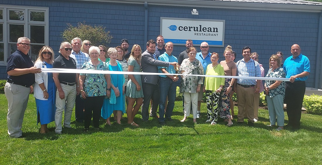 Kosciusko Chamber of Commerce held a ribbon-cutting for Cerulean Restaurant Tuesday. Pictured are Cerulean staff and Chamber staff and amabassadors. Photo by Jackie Gorski, Times-Union