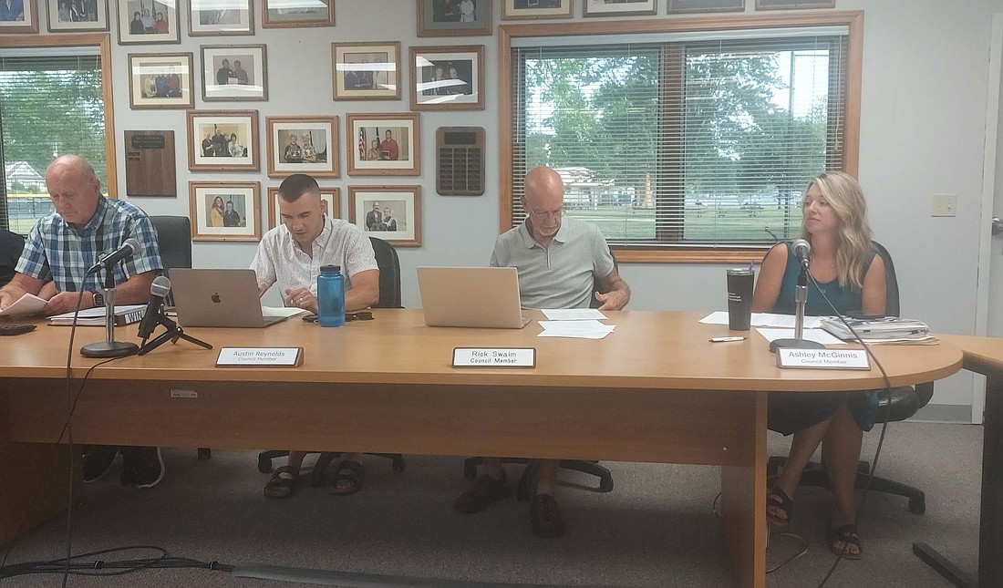 Pictured (L to R) are Winona Lake Town Manager Craig Allebach and Town Council members Austin Reynolds, Rick Swaim and Ashley McGinnis. Photo by Jackie Gorski, Times-Union