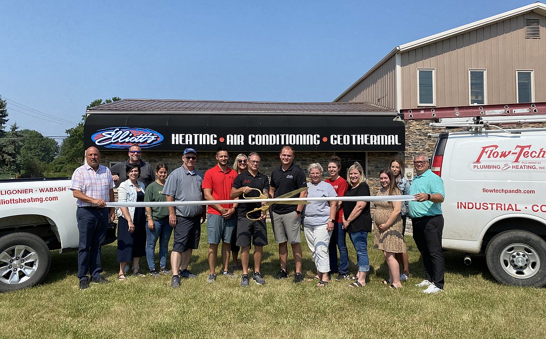 The Kosciusko Chamber of Commerce had a ribbon-cutting to celebrate the partnership between Flow-Tech Plumbing & Heating and Elliott’s Heating & Air on Monday. Flow-Tech bought Elliott’s at 560 S. Zimmer Road, Warsaw, in January. Photo by Leah Sander, InkFreeNews.