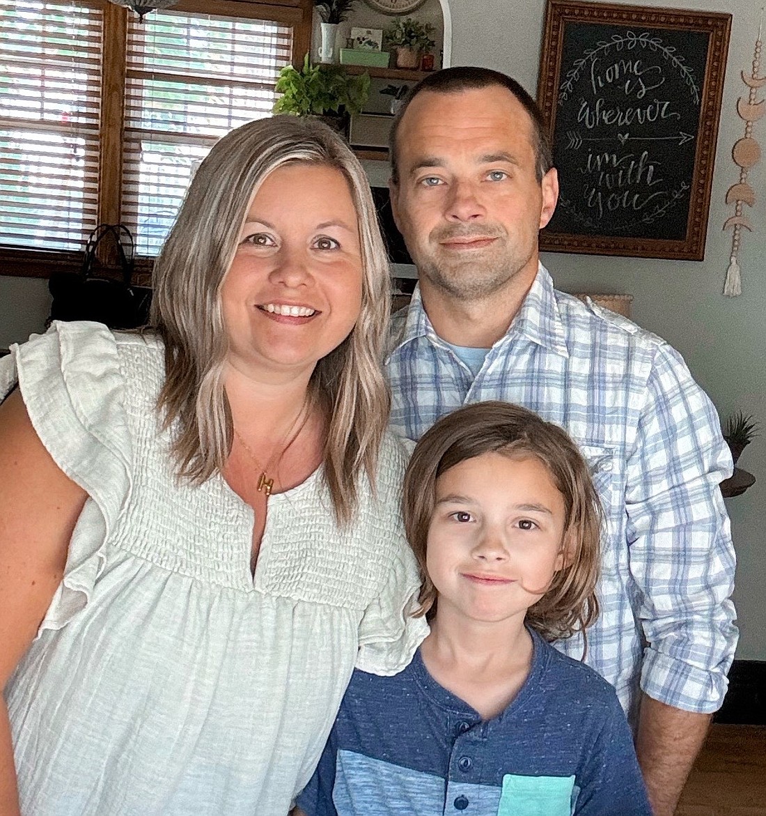 New Lincoln Elementary School Principal Hilary Stouder is pictured with husband Kevin and son Saul. Photo provided.