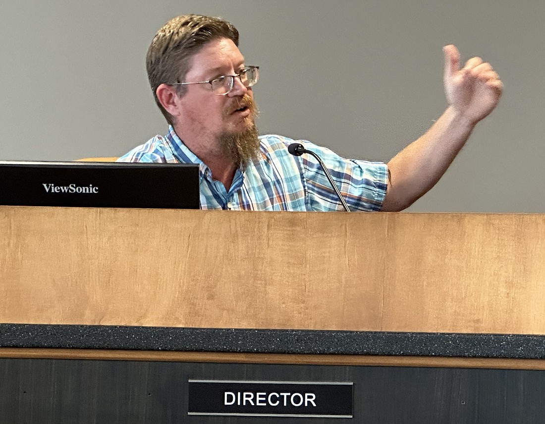 Warsaw Community and Economic Development Director Jeremy Skinner gestures Monday during the Warsaw Redevelopment Commission meeting about acquiring the Warsaw Chemical property on Argonne Road. Photo by David Slone, Times-Union