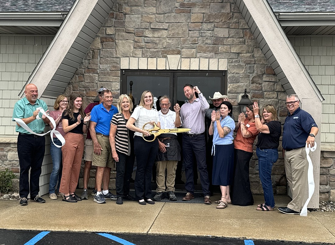 Farmhouse Events and Catering, 9522 N. CR 300E, Syracuse, held its ribbon-cutting Tuesday. Pictured (L to R) are Scott Wiley, Karen Blackburn, Katelyn Wuthrich, Leo Wrage, Don Bucher, Peggy Bucher, Shanda Scheeren, Jim Bryan, Chris Scheeren, Michael Kuhn, Kristi Hull, Melissa Paxton, Dawn Jaggers and Rob Parker. Photo by Marisa Sweatland, InkFreeNews