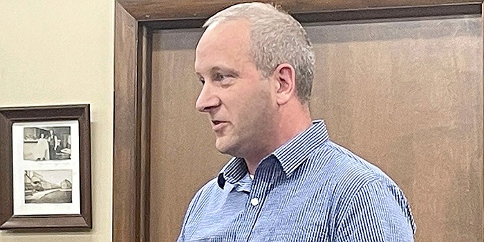 Rusty Holt, supervising traffic engineer with engineering firm WSP, attended Tuesday’s Etna Green Town Council meeting to answer questions about a possible J-turn at the Ind. 19 and U.S. 30 intersection. Photo by Liz Adkins, InkFreeNews