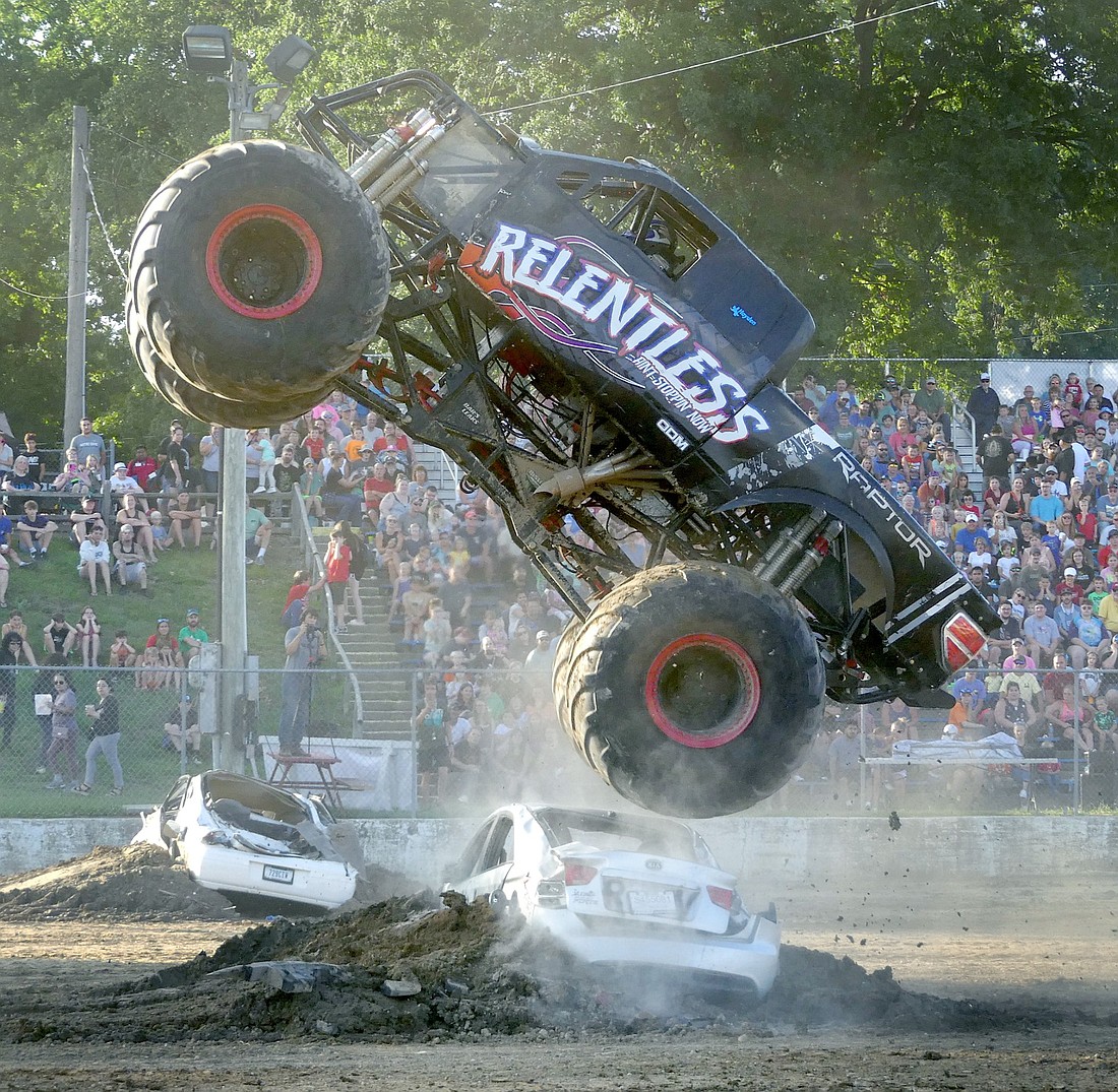 The grandstand was packed with people Wednesday evening to witness some exciting maneuvers during the Extreme Monster Truck Madness. Photo by Gary Nieter, Times-Union