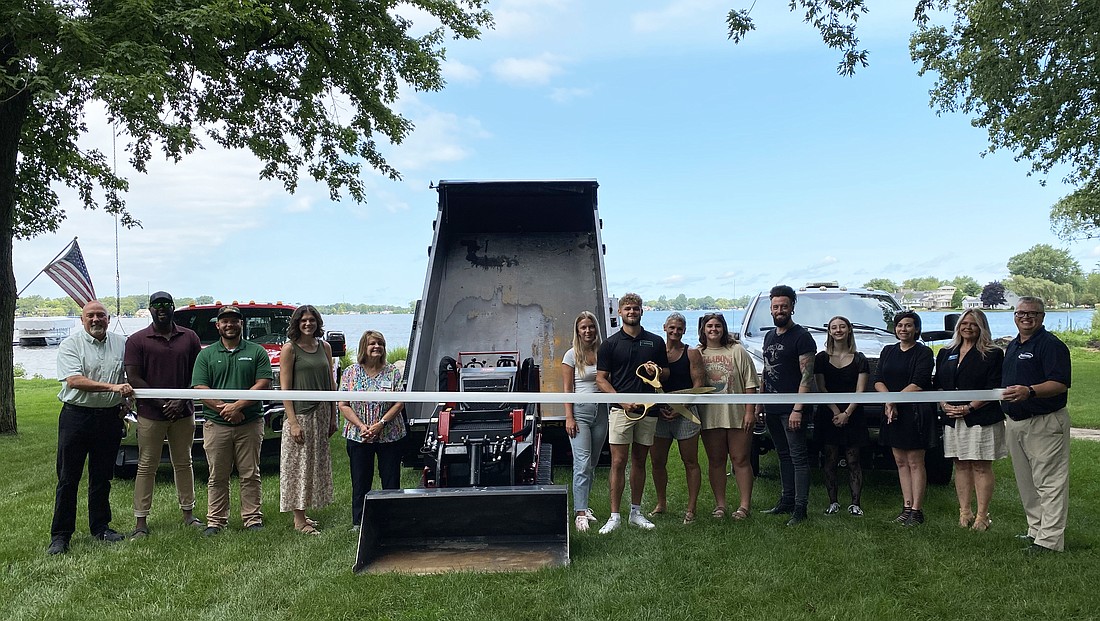 Kosciusko Chamber of Commerce had a ribbon-cutting for A1 Landscape on Monday. It's owned by Colt Van Houten and based in Warsaw. Pictured (L to R) are Chamber Member Relations Manager Scott Wiley; ambassadors Shawn Brown, D.J. Fouce, Brittany Lyon and Dawn Jaggers; Van Houten's fiancée, Aubrie Timmreck; Van Houten; Van Houten's mother, Jennifer Van Houten; Van Houten's sister, Paisley Van Houten; Chamber ambassador Nathan Underneath; Moving Pictures Tattoo Cinema's Calissa Grindle; Chamber ambassadors Kristi Hull and Stacey Leek; and Chamber President and CEO Rob Parker. Photo by Leah Sander, InkFreeNews