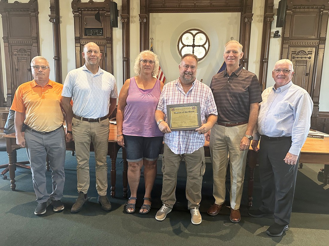 Bradley W. Spratt is the July 2024 Kosciusko County Veteran of the Month. Pictured (L to R) are Darryl McDowell, Kosciusko County veteran service officer; Cary Groninger, county commissioner; Linda and Bradley Spratt; and Brad Jackson and Bob Conley, county commissioners. Photo by David Slone, Times-Union