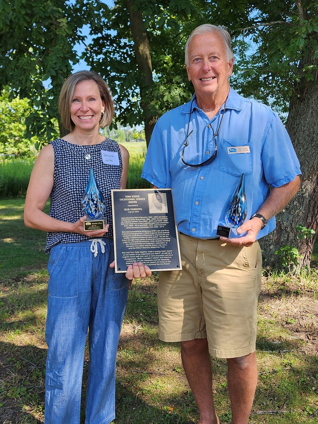 Shannon Silcox (L) and Bob Fanning (R) retiring board members, were presented with the Tear Drop Award. Fanning was also presented the Tom Yoder Exceptional Service Award. Photo by Deb Patterson, InkFreeNews