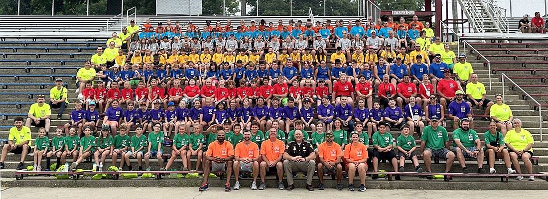 Camp HERO campers and counselors pose for a group photo Wednesday morning. Nearly 200 kids are taking part in the camp that teaches them about first responders. Photo by David Slone, Times-Union