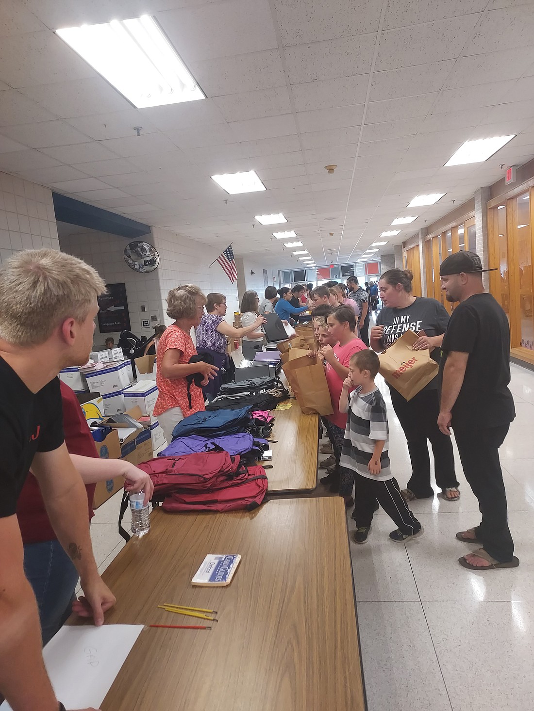 Students pick up school supplies at Tools for School at Lakview Middle School Wednesday. Photo by Jackie Gorski, Times-Union