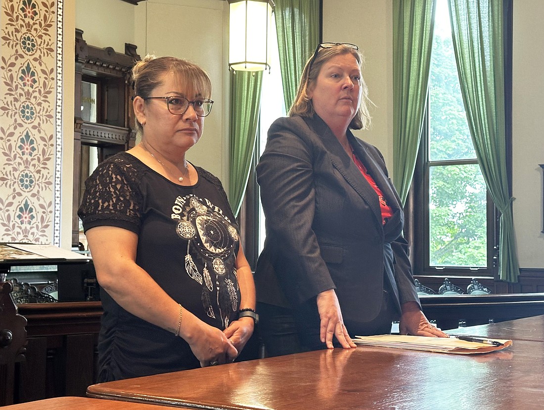 Laura Kaufman (R), legal counsel for Taqueria El Comal owner Hermila Mendoza (L), appear before the Kosciusko County Alcohol and Tobacco Commission Thursday for a new liquor license. Photo by David Slone, Times-Union