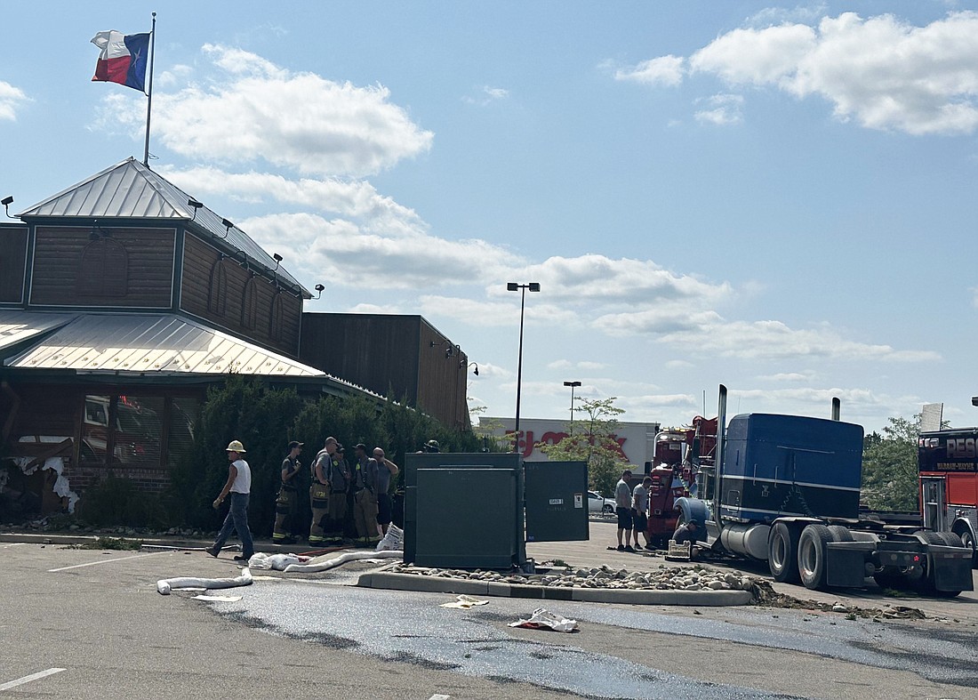 The semi that drove into Texas Roadhouse, 700 W. CR 300N, Warsaw, is shown to the right of the building after being moved. Photo by David Slone, Times-Union