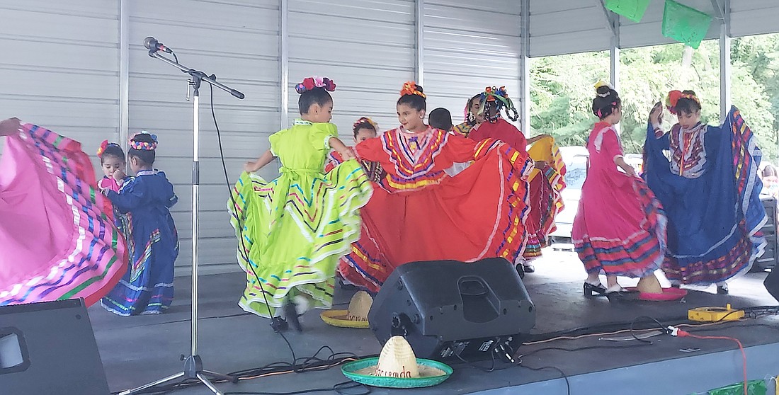 Traditional dancers perform at La Feria Guadalupana at Our Lady of Guadalupe Saturday. Photo by Jackie Gorski, Times-Union