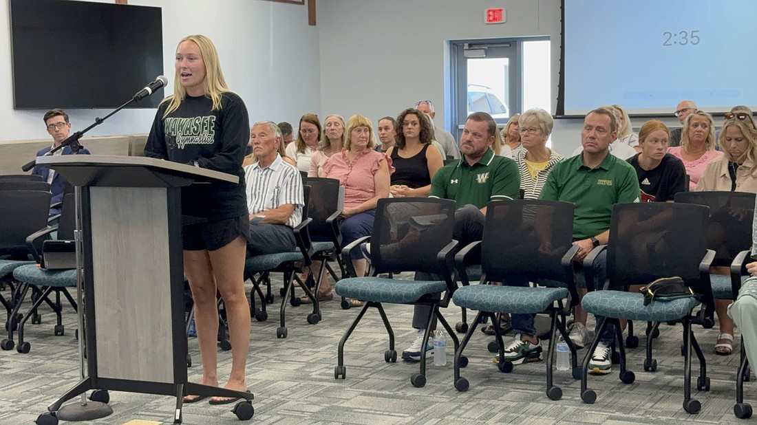 Molly Liston went before the Wawasee School Corporation Board of Trustees Monday to plead to keep gymnastics at Wawasee. Liston, head coach since 2020, received over 2,000 signatures from community members on a petition. Photo by Marissa Sweatland, InkFreeNews.