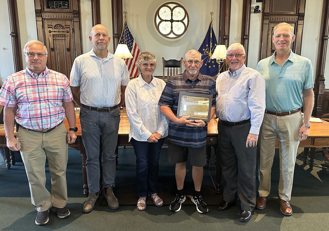 Harold Stambaugh is the August 2024 Kosciusko County Veteran of the Month. Pictured (L to R) are Daryl McDowell, Kosciusko County veteran service officer; Cary Groninger, middle district county commissioner; Debra and Harold Stambaugh; Bob Conley, southern district county commissioner; and Brad Jackson, northern district county commissioner. Photo by David Slone, Times-Union