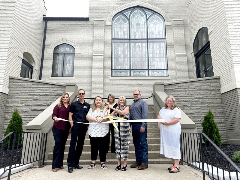 Kaleidoscope representatives cut the ribbon. Photo by Madison Hart,  InkFreeNews