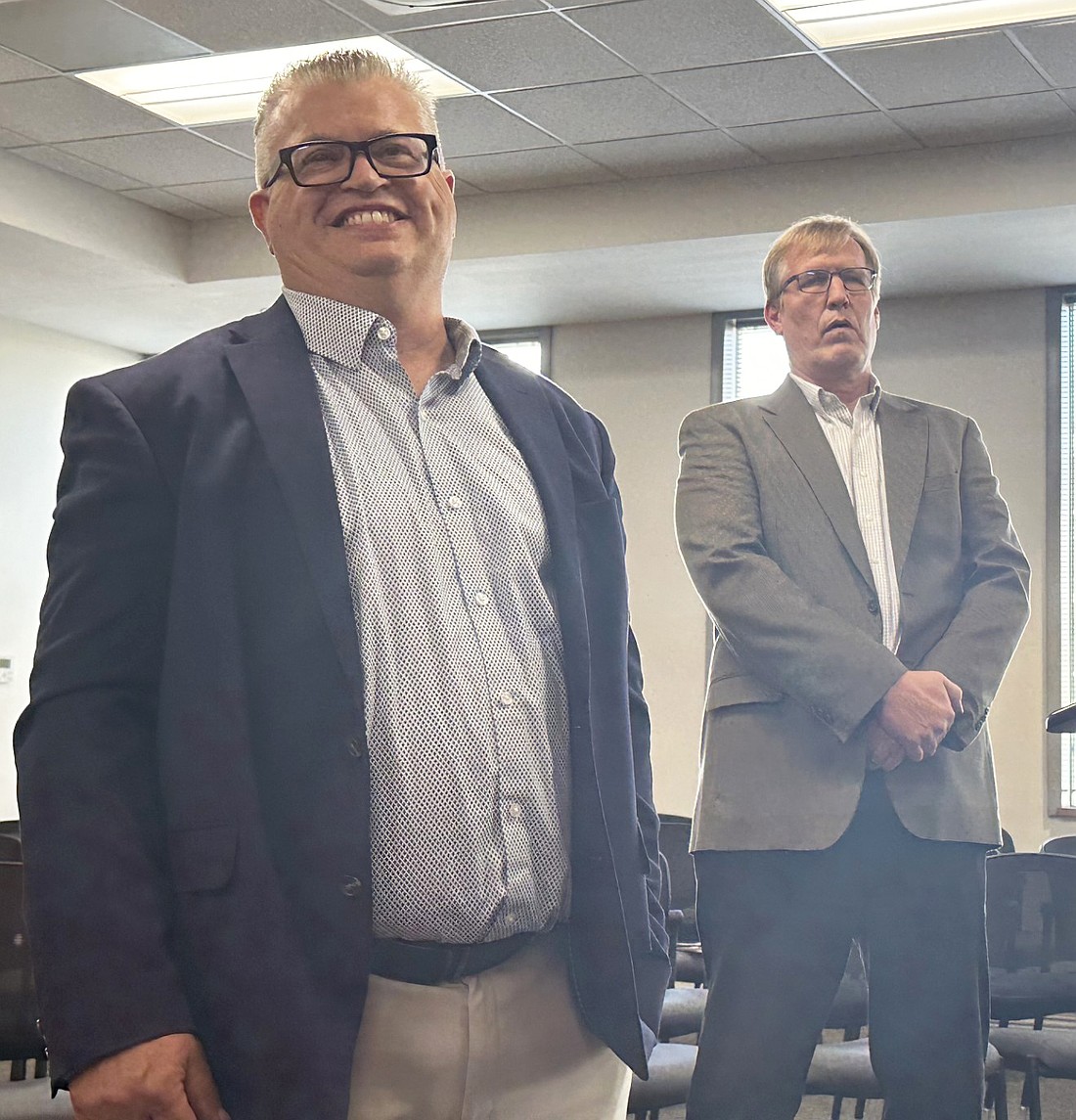 Kosciusko Chamber of Commerce CEO Rob Parker (L) and YMCA of Kosciusko County CEO Jim Swanson (R) speak to the Warsaw Common Council Monday about a play café going into the YMCA’s main campus. Photo by David Slone, Times-Union