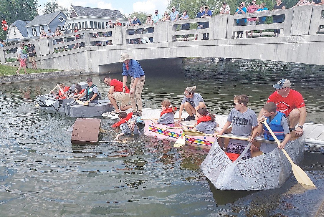 Five of the six teams of Edgewood Middle School students race against each other during 2023’s Canal Days. Unfortunately, The Big Brain Boys’ boat sunk before launch. The Millenium Falcon would later sink during the race. Photo by Jackie Gorski, Times-Union