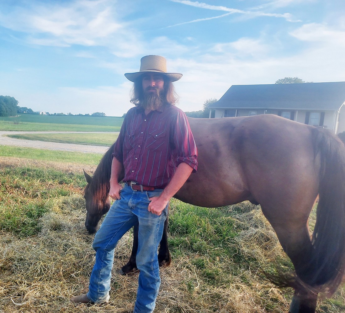 Pictured are Jake Harvath and one of his horses, Eddy. Photo by Jackie Gorski, Times-Union