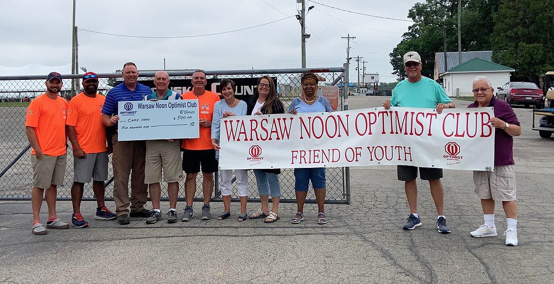 Pictured (L to R) are Kosciusko County Sheriff’s Office Sgt. Justin Smith, Camp HERO coordinator; KCSO deputy Shaun Mudd; Sheriff Jim Smith; Eric Coburn, Noon Optimist Club; KCSO Sgt. Doug Light; Kathy Hamman, Amber Gelbaugh, Yvonne Southall, Jan VanZant and Gaylord Johnston, Noon Optimist Club members. Photo Provided.