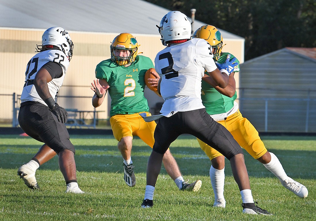 Valley senior Brandon Stiles hits the brakes whiile going up against Hammond Morton's defense...Nieter