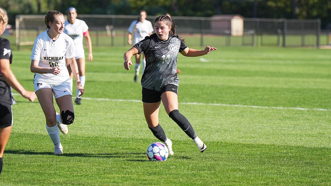 Pictured is Audrey Abel (two assists) dribbling the ball for Grace's women's soccer team on Saturday.