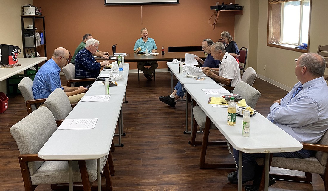 At the Kosciusko County Solid Waste Management District Board meeting on Tuesday are (clockwise, from left): County Commissioners Cary Groninger and Bob Conley; KCSWMD Executive Director Tom Ganser; County Commissioner Brad Jackson; Warsaw Common Councilman Jerry Frush; County Auditor Alyssa Schmucker; County Councilman Dave Wolkins and attorney Scott Reust. Photo by Leah Sander, InkFreeNews