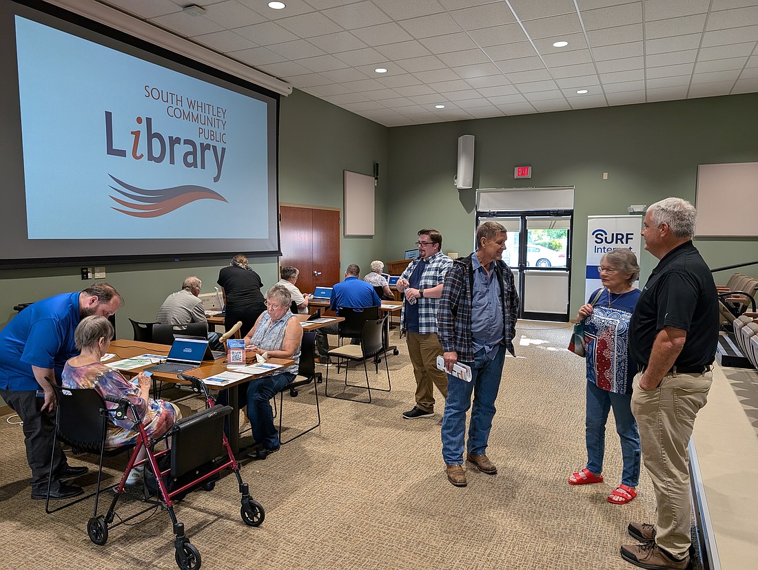 Whitley County residents gather at the South Whitley Community  Public Library on Aug. 20 for a Surf Internet information session to learn more about the Indiana Connectivity Program and application process.