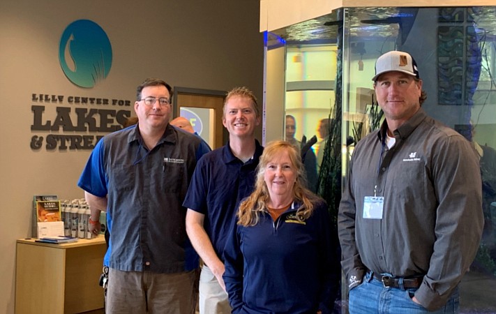 Pictured (L to R) are Kosciusko Leadership Academy cadet David Dohner, sponsored by Instrumental Machine and Development; Dr. Nathan Bosch, director, Lilly Center for Lakes and Streams at Grace College; Heather Harwood, executive director, Wawasee Area Conservancy Foundation; and KLA cadet Mike Whitaker, sponsored by Kosciusko REMC. Photo Provided.