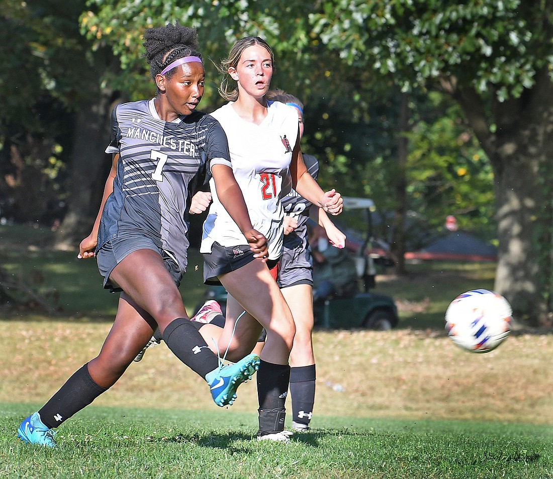 Manchester senior Hanna Stout sends the ball into the net to score Manchester's first goal of the first half...Nieter