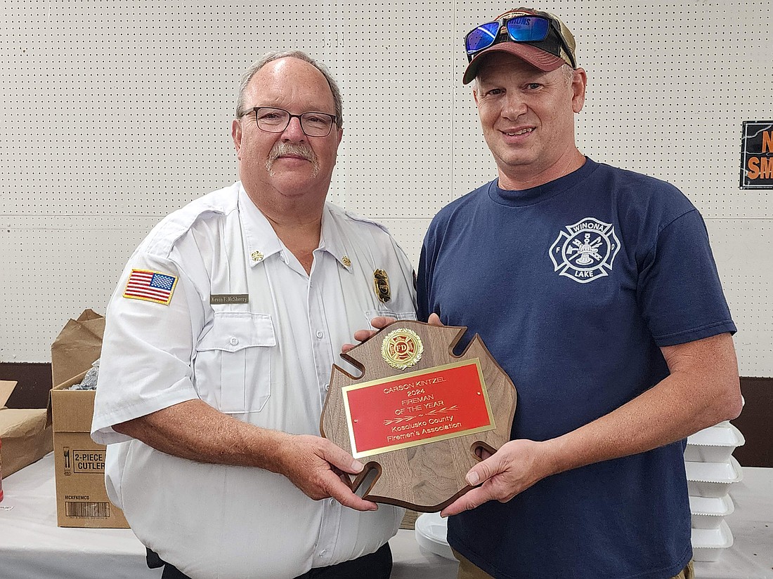 Carson Kintzel (R) was awarded the 2024 Kosciusko Firemen's Association Firefighter of the Year Award. Kevin McSherry, county president, is shown on the left. Photo by Deb Patterson, InkFreeNews