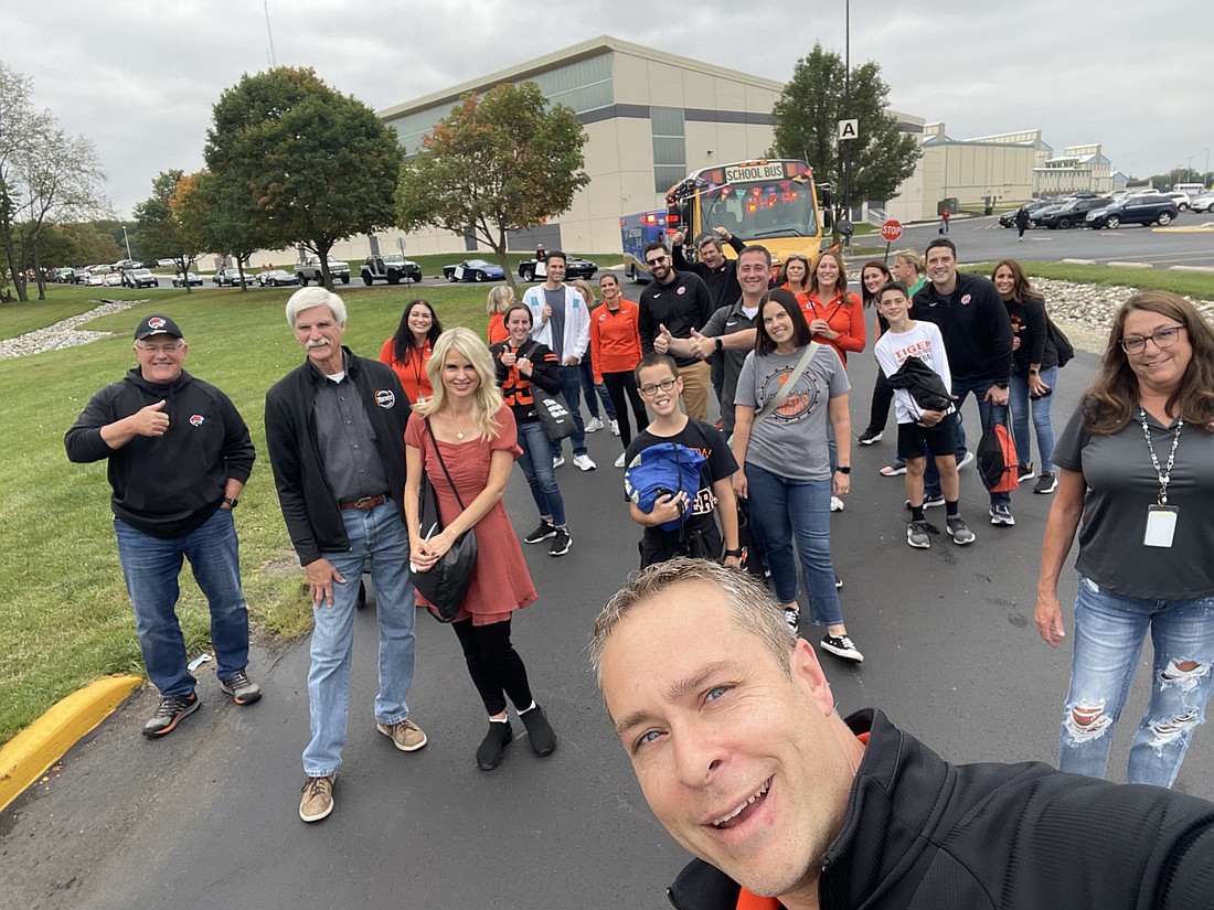 Warsaw Community School Corporation Superintendent Dr. David Hoffert takes a selfie with WCS administrators, staff and family members. Photo Provided.