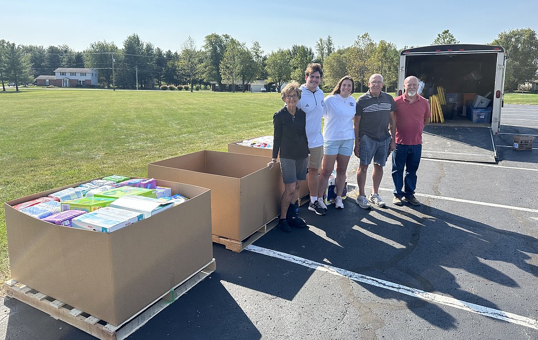 Pictured (L to R) Sunday in the Warsaw Community Church parking lot with some of the donations for Hurricane Helene relief are Ann Sweet, Jacob Hutcherson, Abbey Kuehner, Dane Weaver and Daniel Owens. Photo by David Slone, Times-Union