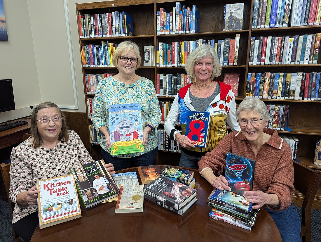 Friends of Syracuse Public Library will host a used book sale Friday and Saturday. Pictured are Friends Lynn Emmert, Sue Kracke, Allyson Ellis and Ruth Judy. Photo Provided.