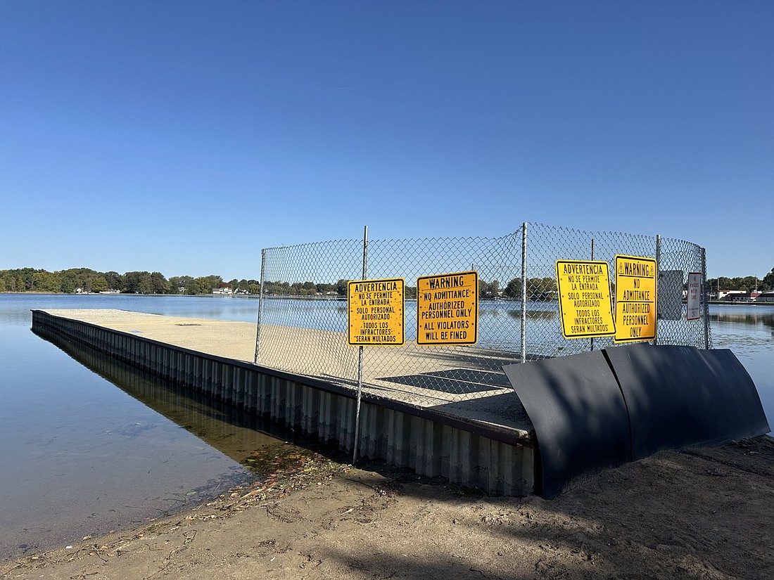 The Center Lake pier has been closed off to the public for some time. The city of Warsaw hopes to remove it by the time the permit with the Indiana Department of Natural Resources expires in April. Photo by David Slone, Times-Union