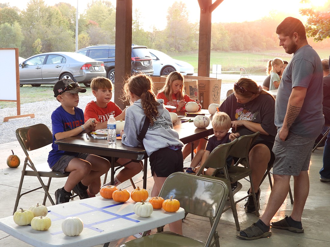 Kids are pictured being creative at the Echoes of the Past Fall Festival Oct. 11-12. Photo Provided