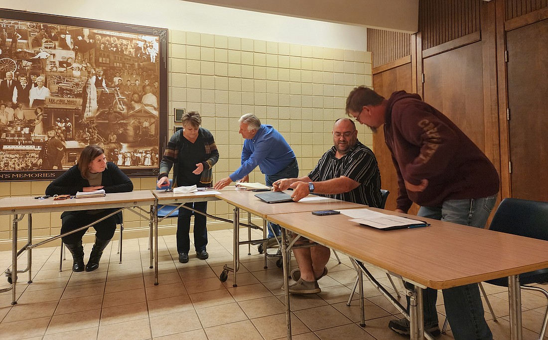 Pierceton Town Council members prepare for their monthly meeting Monday. Pictured (L to R) are Tammy Kern, attorney; Myra Mast, clerk-treasurer; and Council members Glenn Hall, Matt Brubaker and Chauncey Smith. Photo by Deb Patterson, InkFreeNews