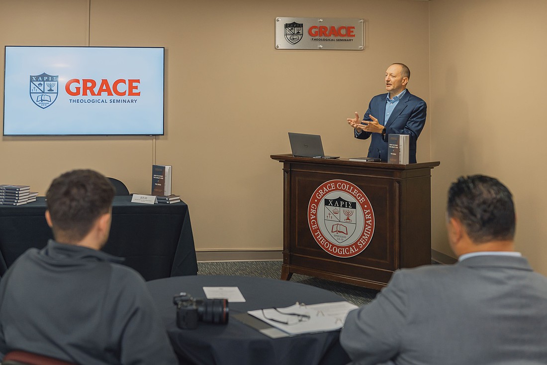 Professor of New Testament Studies at Grace College Theological Seminary Dr. Matt Harmon shares about his newest book, “How to Study the Bible’s Use of the Bible,” at the book signing. Photo Provided.