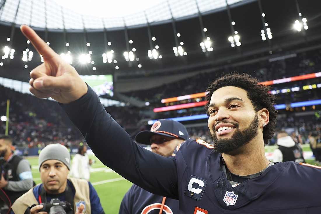 Chicago Bears quarterback Caleb Williams (18) gestures as he reacts after an NFL football game at the Tottenham Hotspur stadium between the Jacksonville Jaguars and Chicago Bears in London, Sunday, Oct. 13, 2024. (AP Photo/Ian Walton)