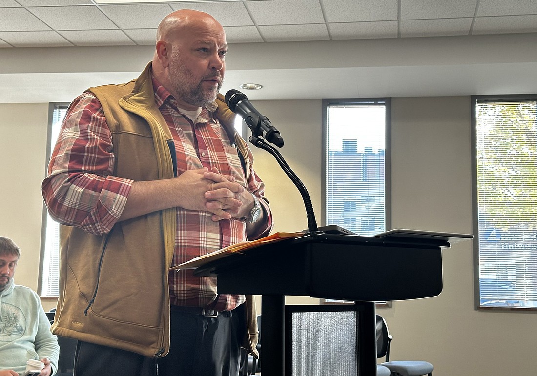 City engineer Aaron Ott listens to the Warsaw Board of Public Works and Safety on Friday talk about the bids from G & G Hauling & Excavating. Photo by David Slone, Times-Union