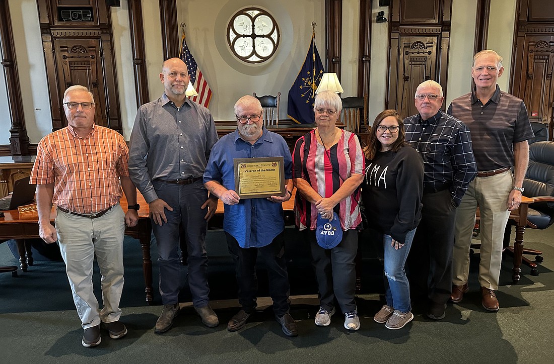 Michael Coy is the October 2024 Kosciusko County Veteran of the Month. Pictured (L to R) are Kosciusko County Veteran Service Officer Darryl McDowell, County Commissioner Cary Groninger, Michael Coy, Cathy Coy, daughter Tiffany Goff and County Commissioners Bob Conley and Brad Jackson. Photo by David Slone, Times-Union