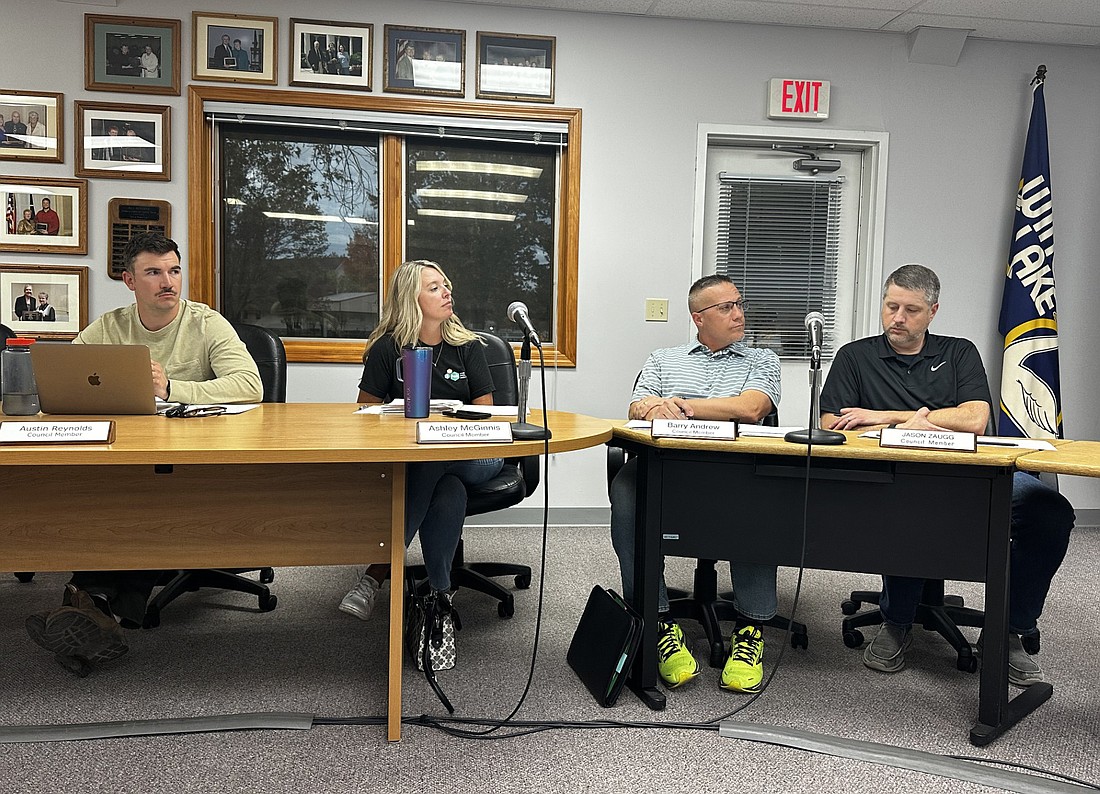 Pictured listening to Winona Lake Clerk-Treasurer Heather James (not pictured) are Council members (L to R) Austin Reynolds, Ashley McGinnis, Barry Andrew and newcomer Jason Zaugg. Also not pictured is Council President Jim Lancaster. Photo by David Slone, Times-Union