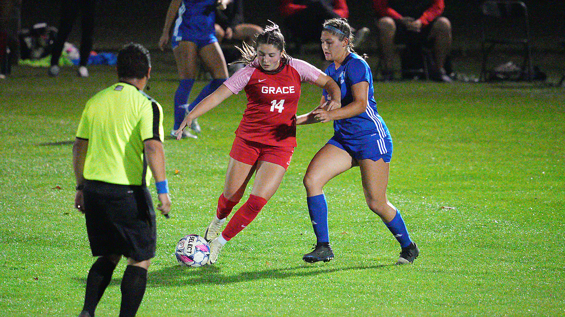 Pictured is Aubrey Abel dribbling in the midfield for Grace's women's soccer team. Abel finished with two assists in Grace's win. Photo Provided.