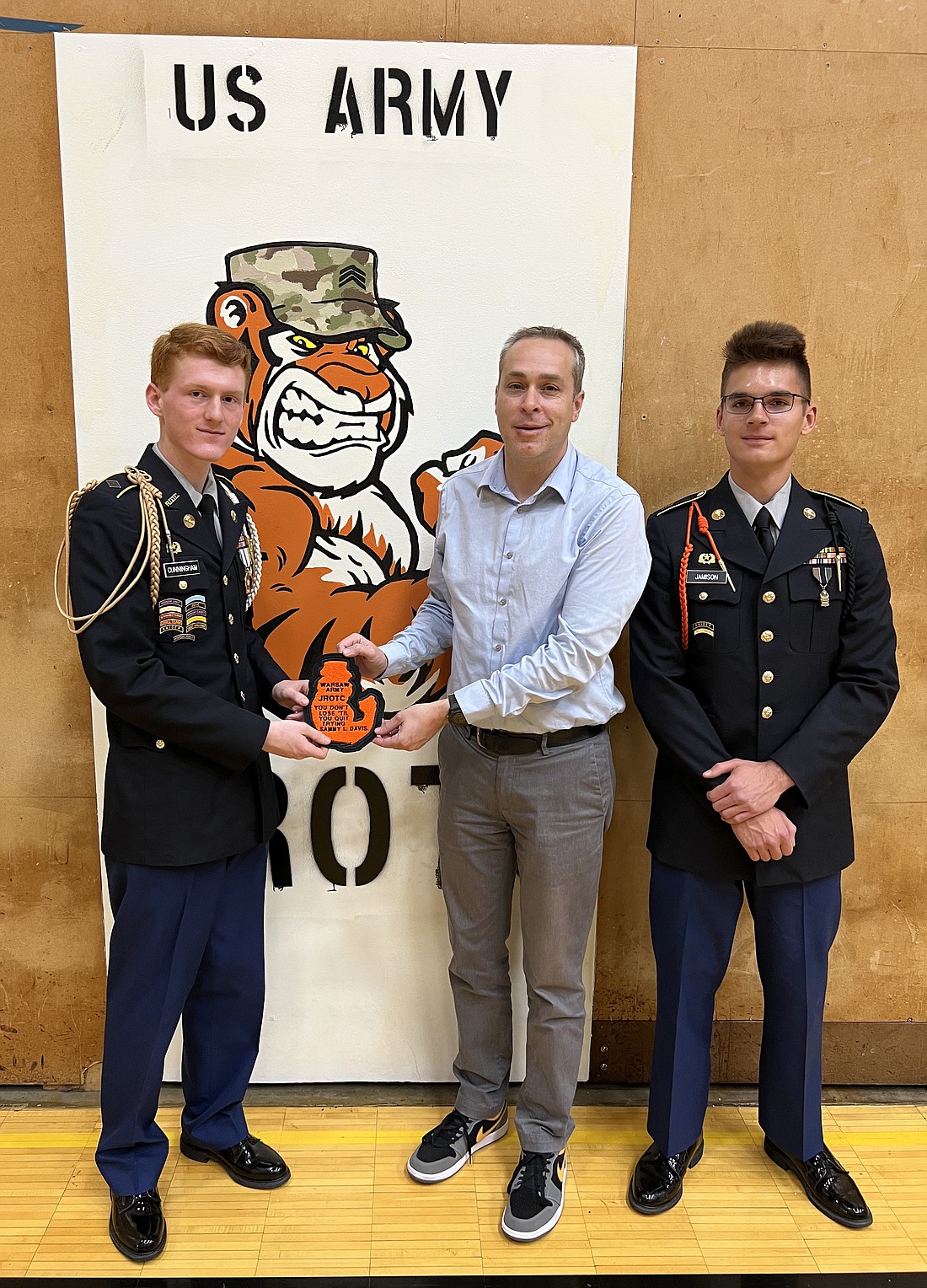 Pictured (L to R) are Cadet Lt. Col. Jayden Cunningham, cadet battalion commander; Dr. David Hoffert, Warsaw Community Schools superintendent; Cadet Command Sgt. Major Jordance Jamison, senior enlisted advisor to the cadet battalion commander. Photo Provided.