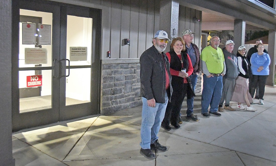 A line quickly begins to form at the Center Lake pavilion at 5:45 Tuesday morning as voters line up to cast their ballots for Tuesday’s elections. Photo by Gary Nieter, Times-Union