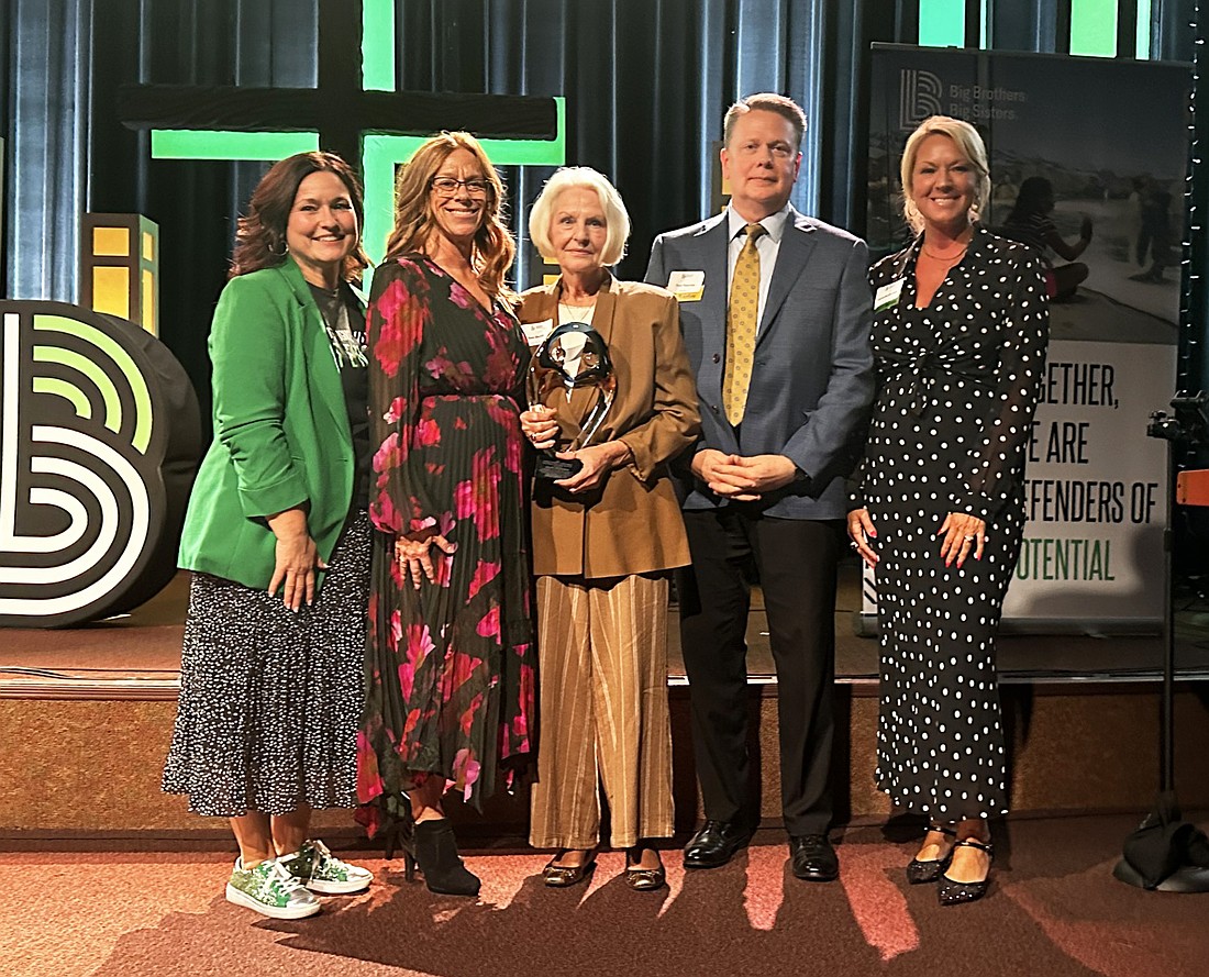 In memory of Esther Pfleiderer and all of her charitable contributions to organizations like Big Brothers Big Sisters, the Charles D. Smith Award was presented to her. Pictured (L to R) are Josette Rider, executive director of Big Brothers Big Sisters; Tammy Smith, development director for Big Brothers Big Sisters of Kosciusko County; Ann Smith, the widow of Charles D. Smith; Tom Tearney, trust administrator with 1st Source Bank; and Michelle Smith Hansen, Charles’ daughter. Photo by David Slone, Times-Union