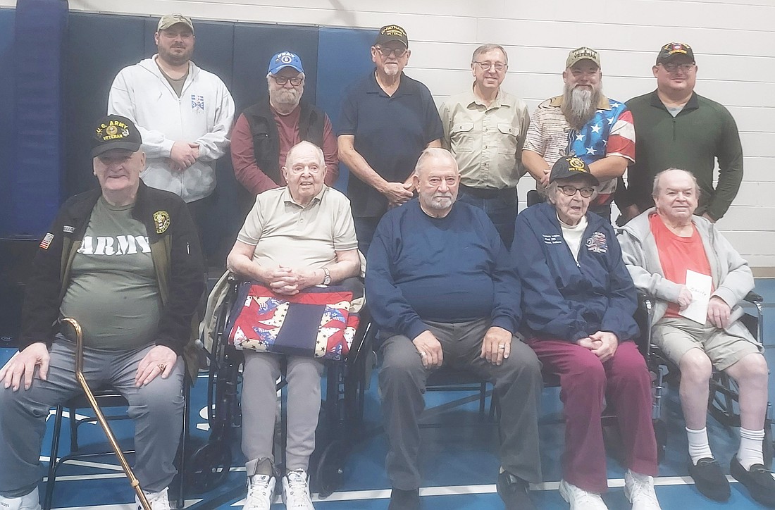 Pictured (L to R) are, front row: Otis Williams, Gail Martin, David Richards Sr., Carolyn Gunder, Ralph Vincent; back row: Justin Raymer, Michael Coy, Douglass Farrell, Henry Miller Jr.,  Michael Walsh and Jeremy Doerr. Photo by Jackie Gorski, Times-Union