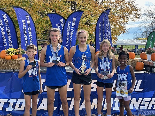 Members of the WR2 team stand with their medals and trophies after the Middle School Nationals Cross Country meet in Louisville. Photo Provided