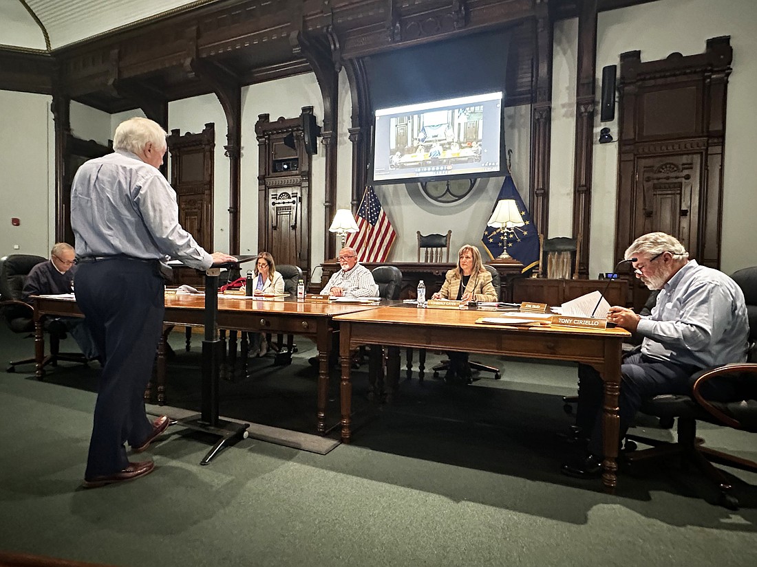 Attorney Steve Snyder (standing) makes a request for tax abatements on behalf of Louis Dreyfus to the Kosciusko County Council Thursday night. Photo by David Slone, Times-Union