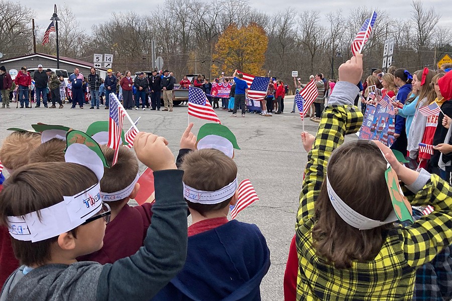 South Whitley Elementary School students encircle veterans from the community. Photo Provided.