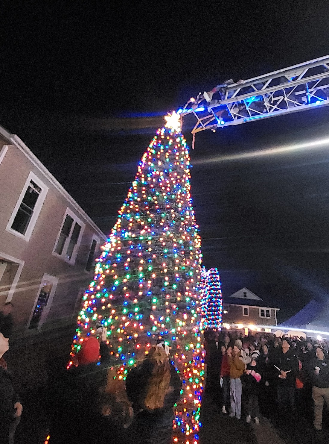 The Christmas tree next to Letterwood at The Village at Winona was lit Saturday. Photo by Jackie Gorski, Times-Union